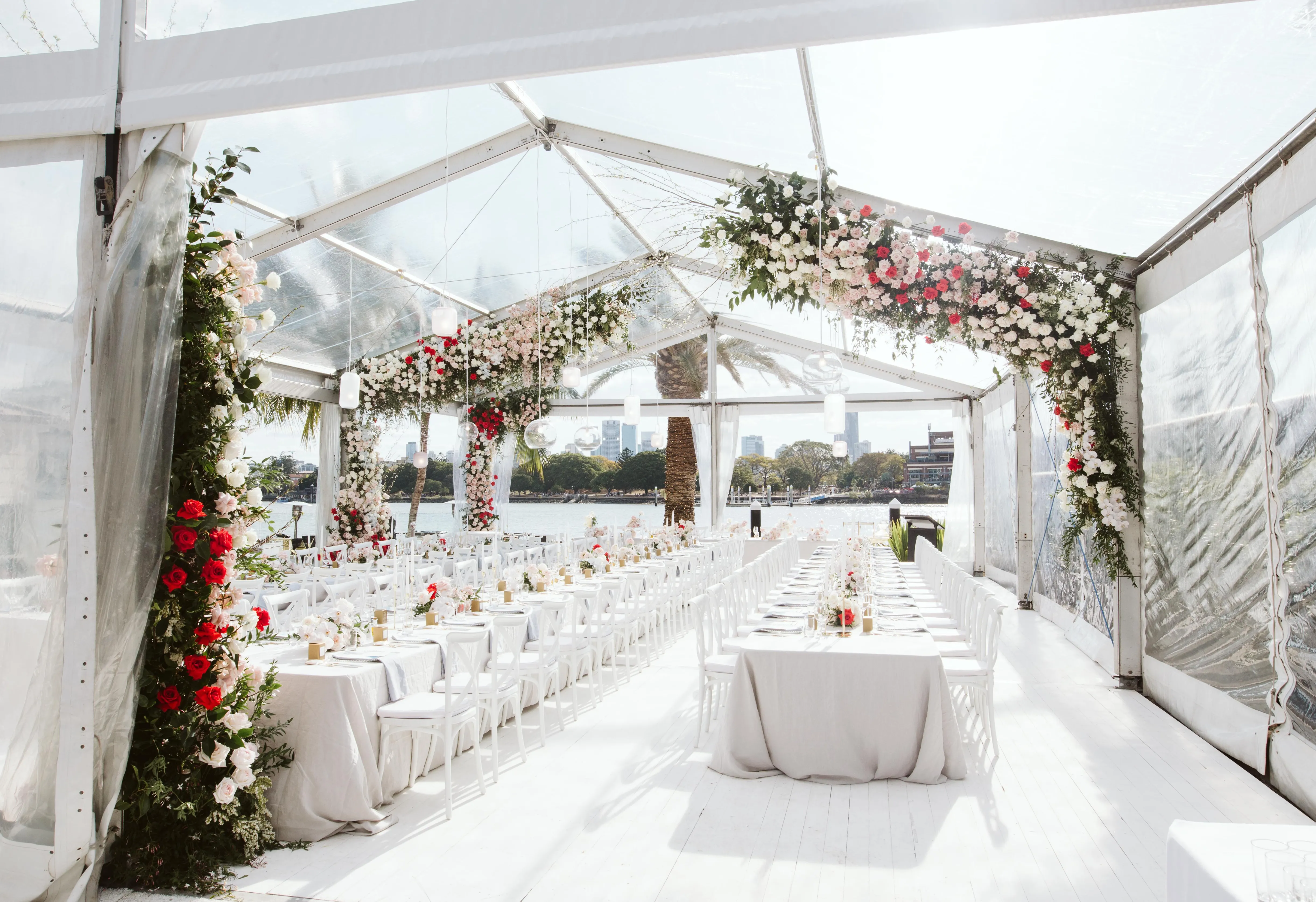 Wedding Flowers in Brisbane, white tables with red and white roses.