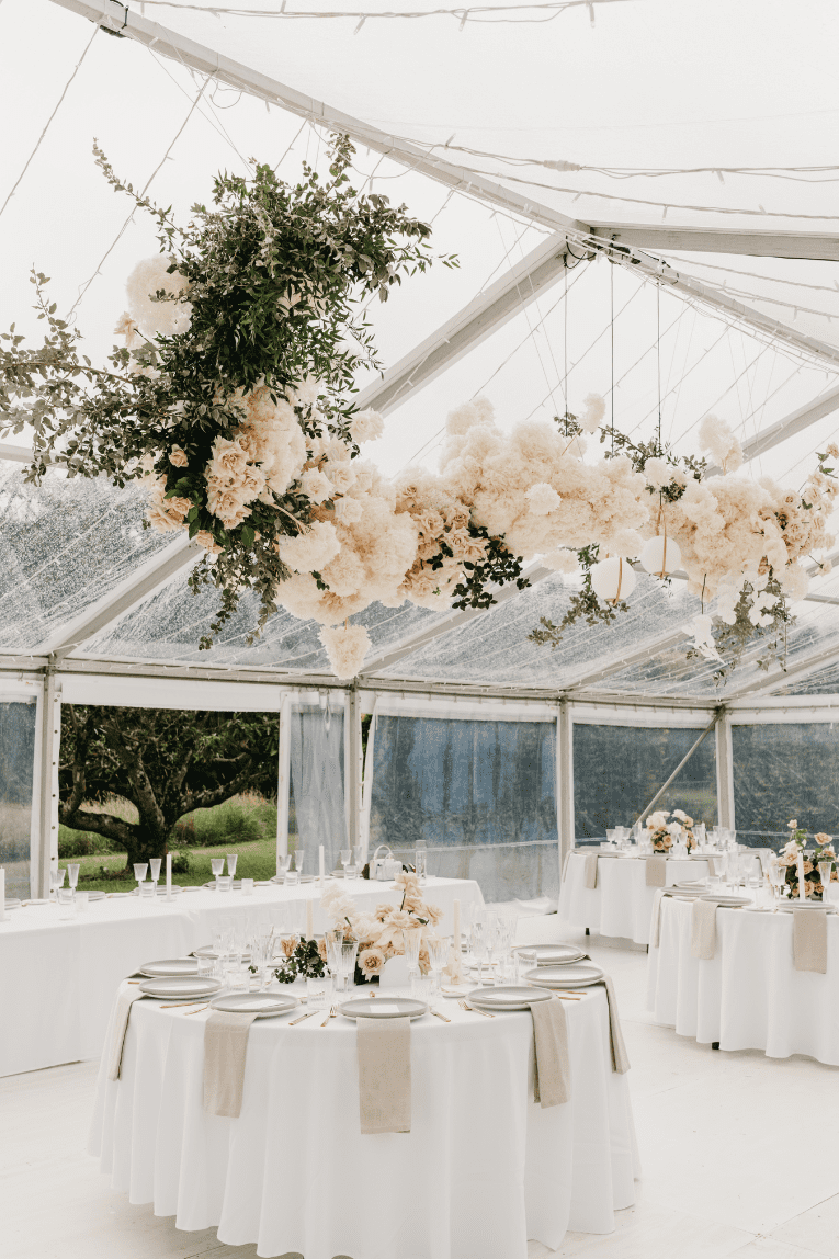 Classic white wedding flowers arranged for an elegant Brisbane wedding reception.