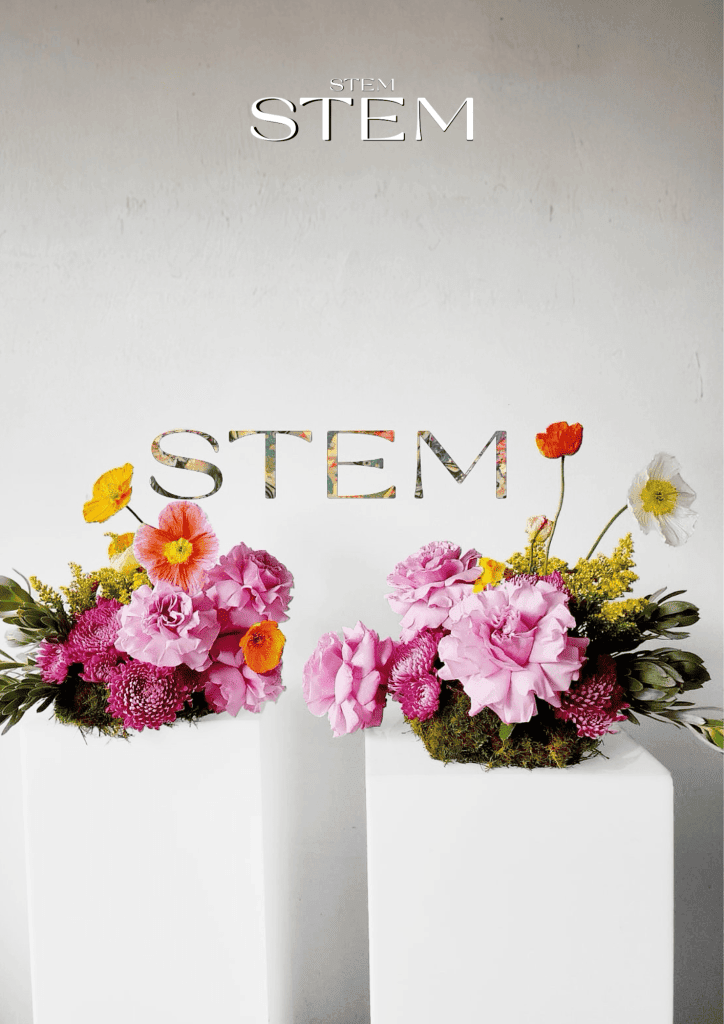 Bright floral arrangements in pink and orange created by Stem Design for a corporate celebration in Brisbane.