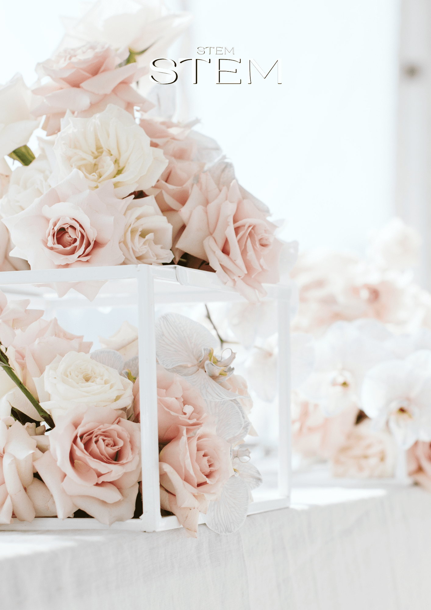 Soft blush and white wedding flowers styled for an elegant Brisbane reception table.
