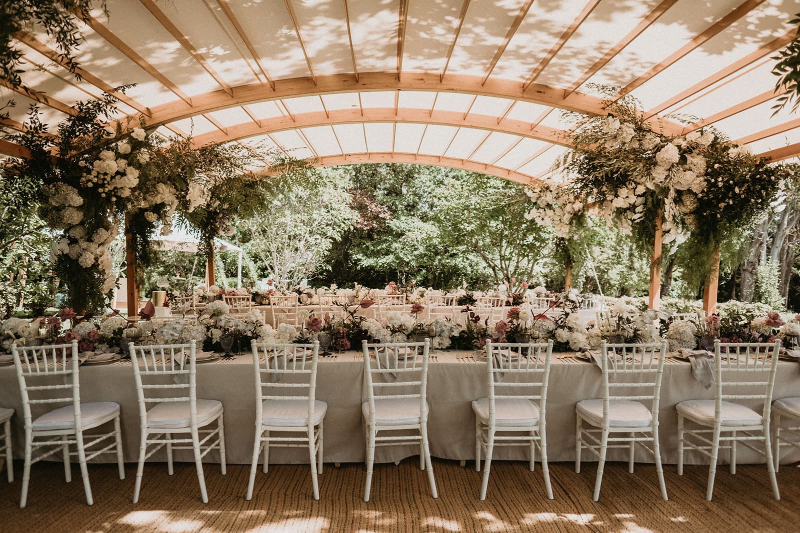 Bespoke floral centrepieces and reception styling by Stem Design.