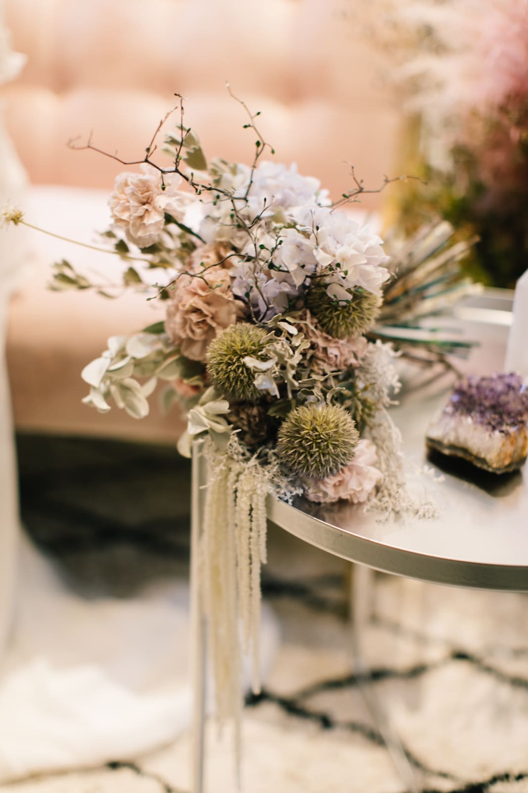 Bespoke floral centrepieces and reception styling by Stem Design.