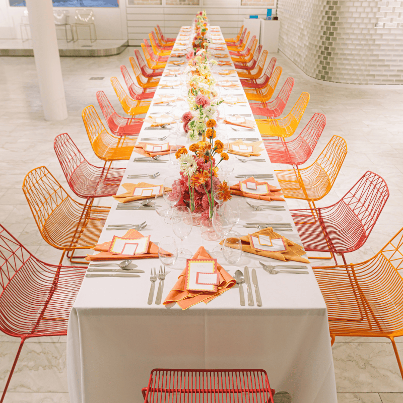 Colourful event tablescape with floral centrepieces in Brisbane