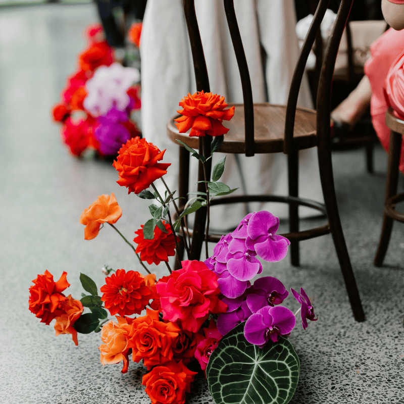 Bright red pink and orange event flowers in Brisbane